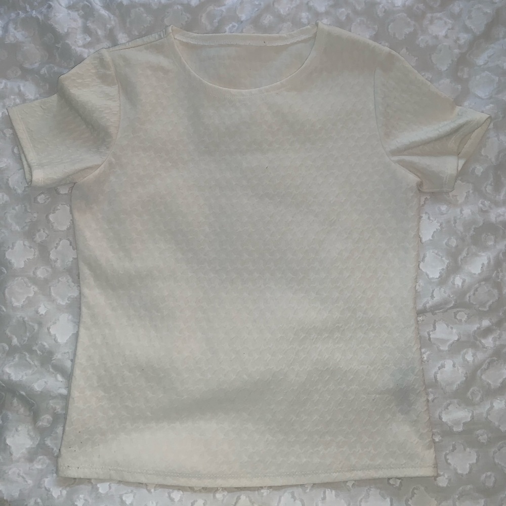 Ivory quilted top, elegant and comfortable